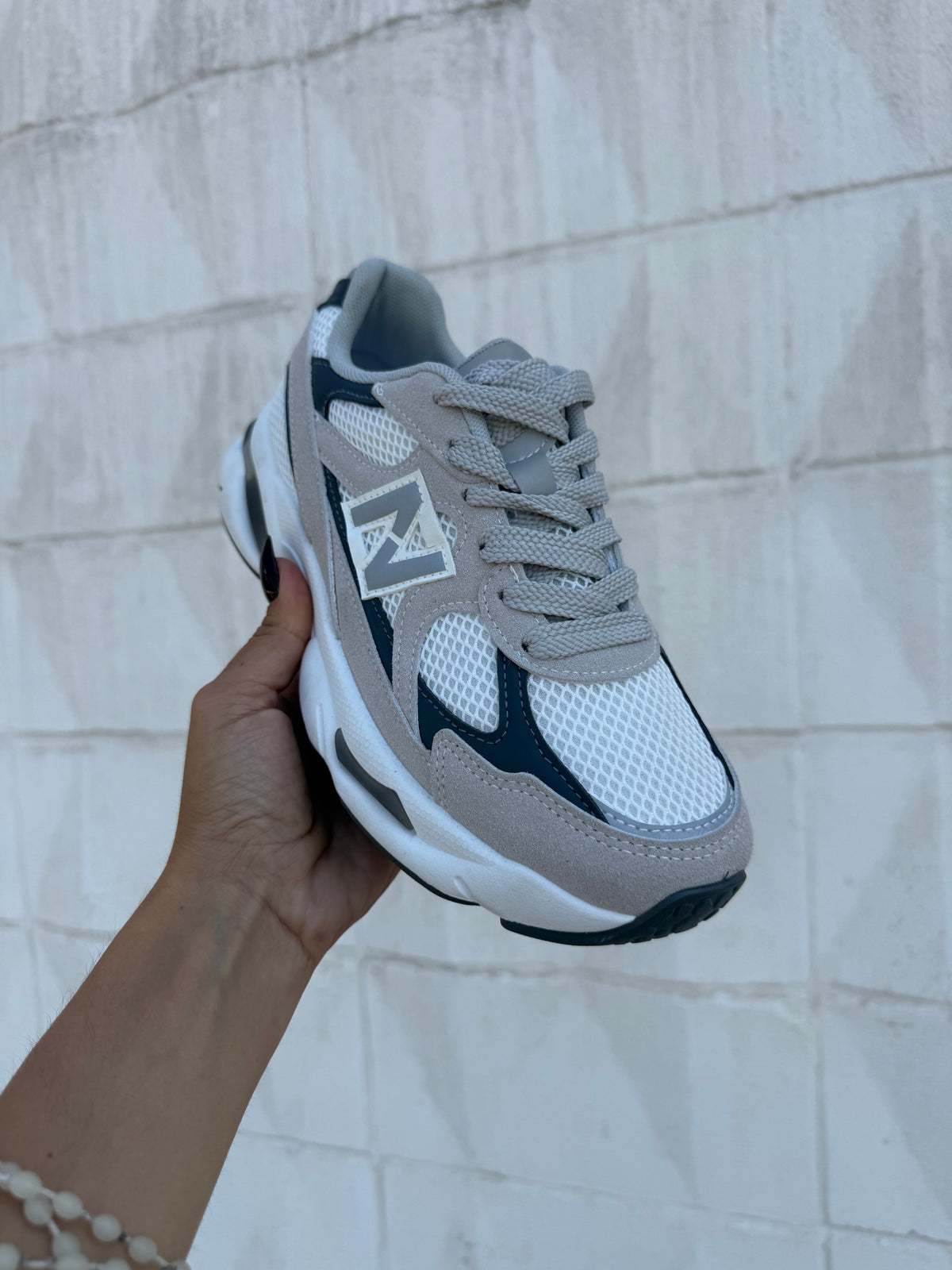DEPORTIVA NB GRIS